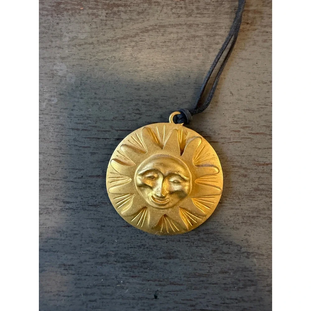 Vintage Gold Tone Sun Medallion Necklace Celestial Smiling Face Black Cord 20in